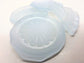 Light blue seaglass pieces with flower pattern